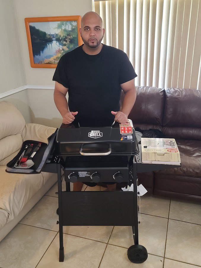 homes united the homeless project david putting together a grill caro