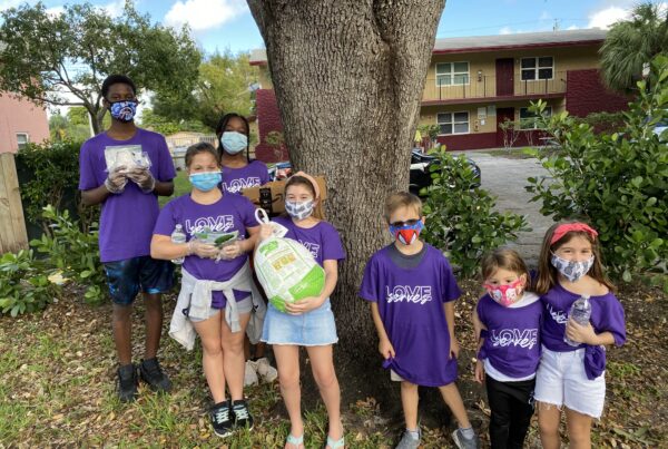 The Homeless Projects Love Serves Children Donating Food