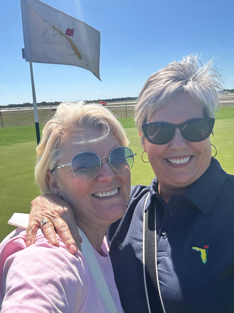 HomesUnited Ministries Annual Golf Classic Action 2 players servers Alice Mellor Helping Donors